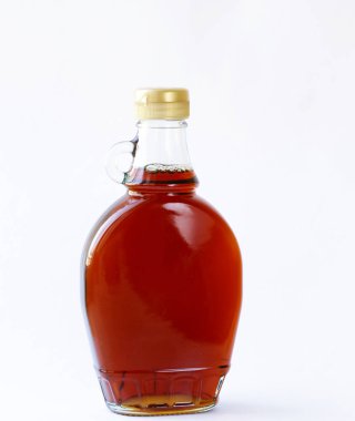Akçaağaç şurubu bir cam şişe - tatlı tatlı sos