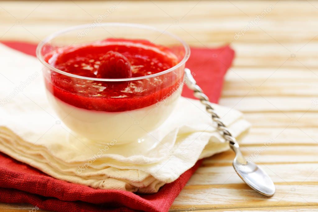 Milk dessert panna cotta with raspberry jam