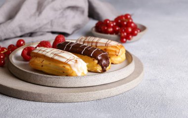 French pastries of choux pastry eclairs