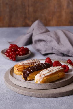 French pastries of choux pastry eclairs
