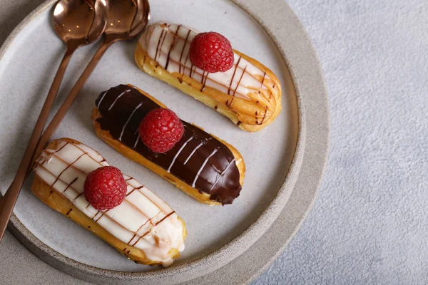 French pastries of choux pastry eclairs