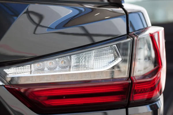 New car with elegant taillights. Side view. — Stock Photo, Image