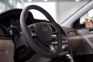 Russia, Izhevsk - October 16, 2019: Hyundai showroom. Interior of new modern Sonata in dealer showroom. Famous brand.