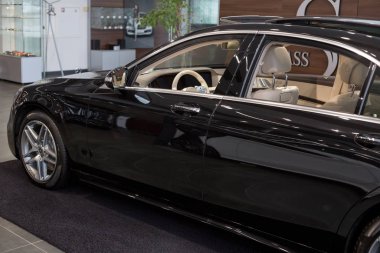 Russia, Izhevsk - February 20, 2020: Mercedes-Benz showroom. Interior of new modern car premium class S 350d. Famous world brand. Prestigious vehicles.