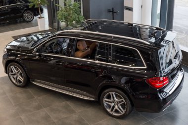 Russia, Izhevsk - February 20, 2020: New modern GLS 350d car in the Mercedes-Benz showroom. View from above. Famous world brand.