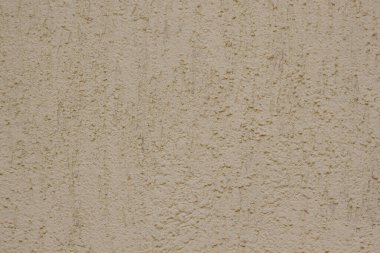 Kahverengi, el yapımı kaba duvar kağıdı. Güzel dekoratif gri alçılı duvar. Metnin için boşluk kopyala..