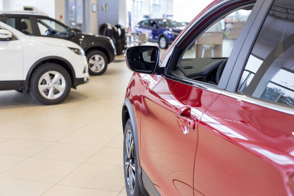 Russia, Izhevsk - March 19, 2020: Nissan showroom. New cars in the dealer showroom. Famous world brand.