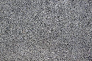 Arkaplan olarak mermer ya da granit doku kullanılır. Birçok deliği olan soyut gri doku. Metnin için boşluk kopyala.