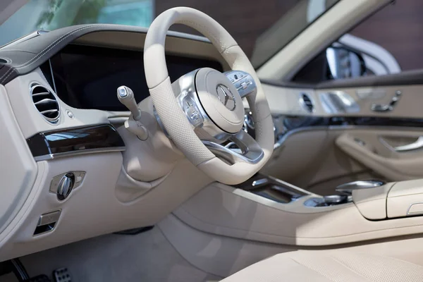 Russia, Izhevsk - February 20, 2020: Mercedes-Benz showroom. Interior of new modern car business class S 350d. Famous world brand. Prestigious vehicles.
