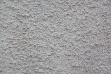 Gri alçılı el yapımı sert duvar kağıdı. Güzel dekoratif gri alçılı duvar. Kaba doku.