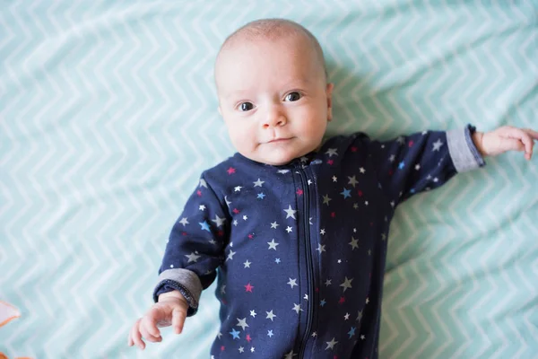 Baby Boy Plays Blue Blanket Wearing Blue Sleeper Smiling Camera — Stock Photo, Image