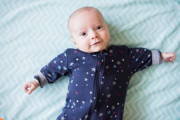 Baby Boy Plays Blue Blanket Wearing Blue Sleeper Smiling Camera — Stock Photo, Image