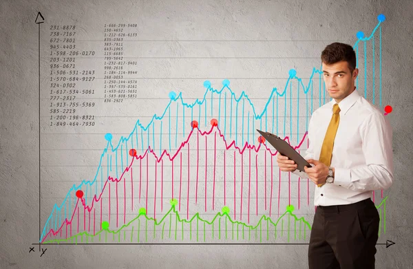 Színes diagram számokkal és üzletemberrel — Stock Fotó