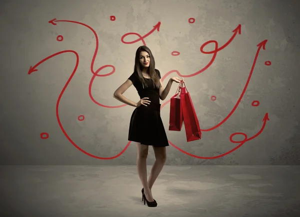 Mujer con estilo de compras y flechas rojas —  Fotos de Stock