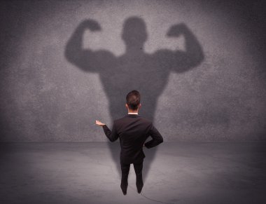 Güçlü gölgesi olan başarılı bir iş adamı.