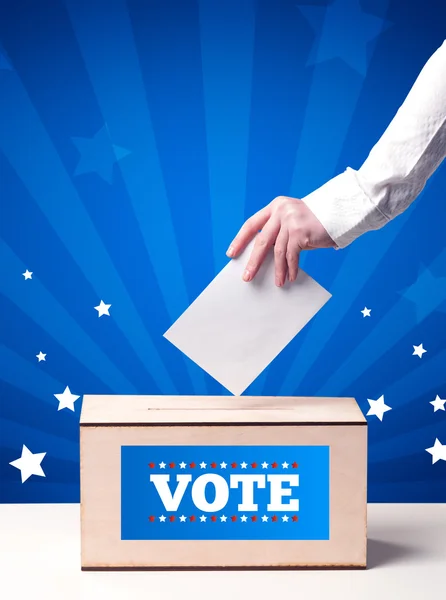 Hand with ballot and wooden box — Stock Photo, Image