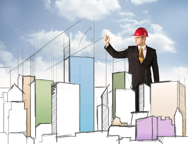 Construction worker planning a city sight — Stock Photo, Image