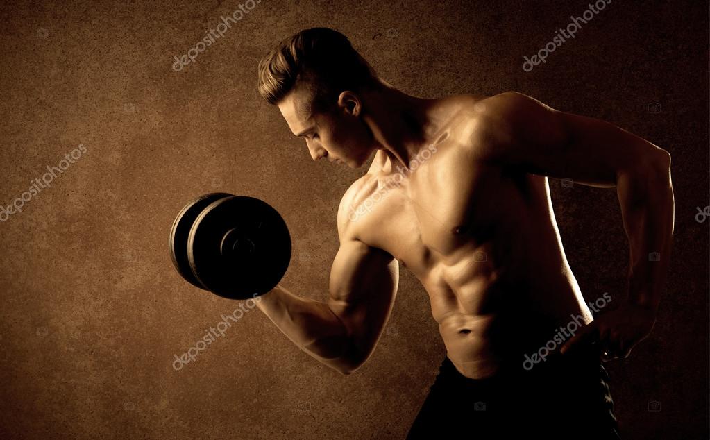 Muskulos Fitter Bodybuilder Athlet Beim Gewichtheben Stockfoto