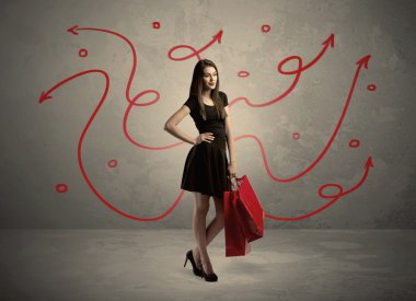 Şık kadın alışverişi ve kırmızı oklar