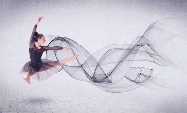 Modern balerin soyut girdaplarla dans ediyor.