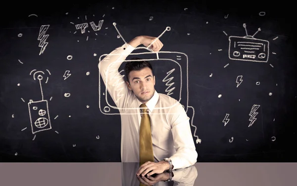 Happy businessman drawing tv and radio — Stock Photo, Image