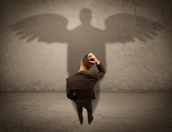 Vendedor honesto com conceito de sombra de anjo — Fotografia de Stock