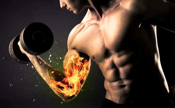 Bodybuilder athlete lifting weight with fire explode arm concept — Stock Photo, Image