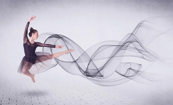 Modern ballet dancer performing with abstract swirl — Stock Photo, Image