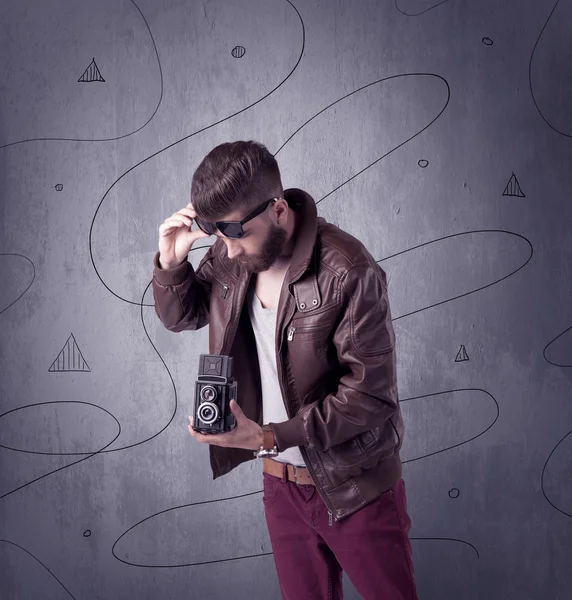 Hipster guy with beard and vintage camera — Stock Photo, Image