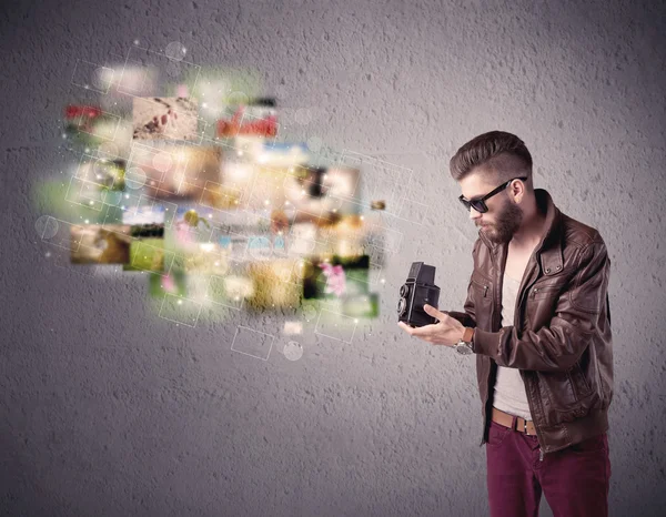 Young malewith beard taking vintage photos — Stock Photo, Image