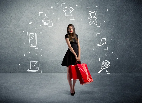 Shopping female with bags and drawn icons — Stock Photo, Image