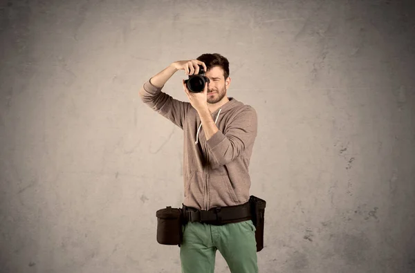 Hobby photographer holding camera — Stock Photo, Image