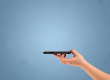 Telefon aygıtı profilden tutuluyor