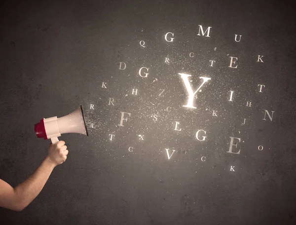 Megaphone with letters — Stock Photo, Image