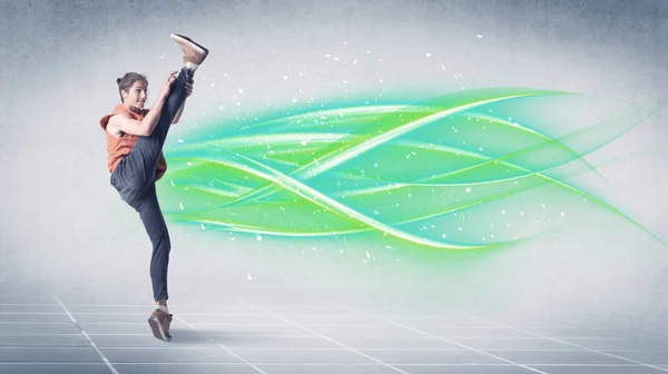 Hip hop dancer posing with green lines — Stock Photo, Image