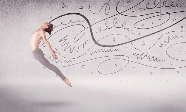 Bailarina de ballet realizando danza artística con líneas y flechas — Foto de Stock