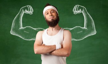 Sıska genç adam çalışıyor.