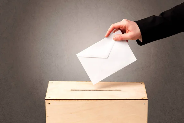 Ballot box with person casting vote — Stock Photo, Image