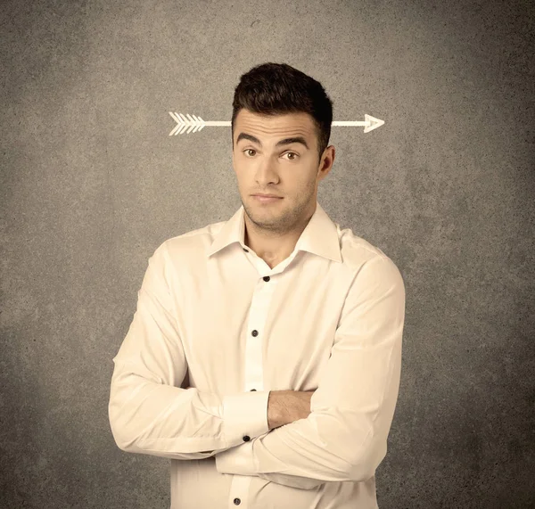 Young sales guy with arrow in the head — Stock Photo, Image