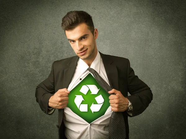 Enviromentalist business man tearing off shirt with recycle sign — Stock Photo, Image