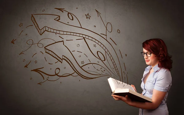 Young lady holding book with arrows — Stock Photo, Image