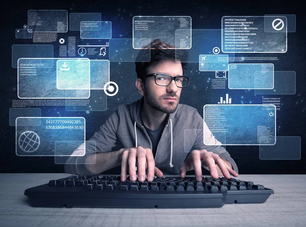 Nerd with glasses hacking websites — Stock Photo, Image