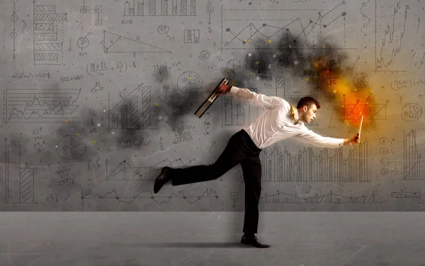 Running business man with fire laptop — Stock Photo, Image