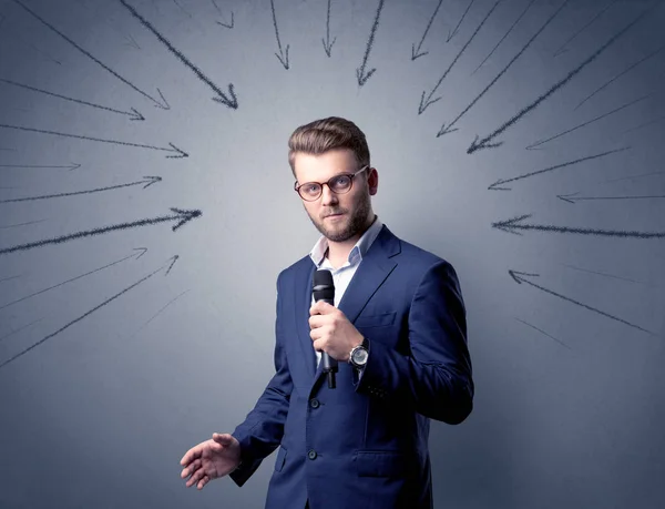 Businessman holding microphone — Stock Photo, Image