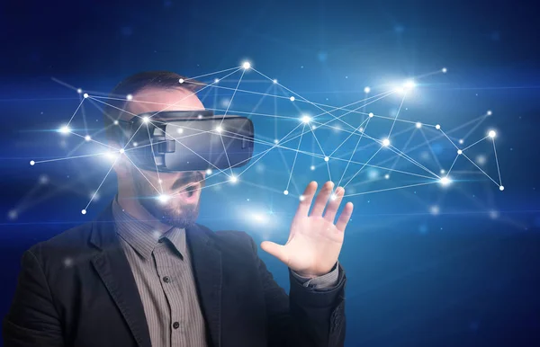 Businessman with virtual reality goggles — Stock Photo, Image