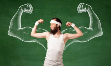 Sıska genç adam çalışıyor.