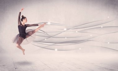 Bale dansçısı soyut çizgilerle modern dans gösterisi yapıyor. 