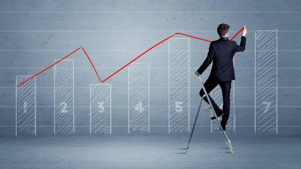 Mann zeichnet Diagramm von Leiter — Stockfoto