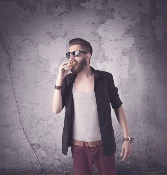 Handsome hipster in fashion clothing — Stock Photo, Image