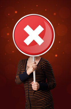 Tutan kadın x işareti